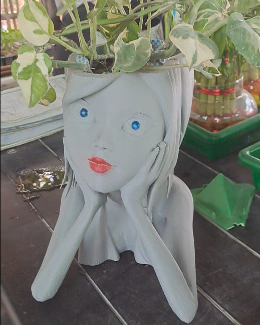Cute girl planter
